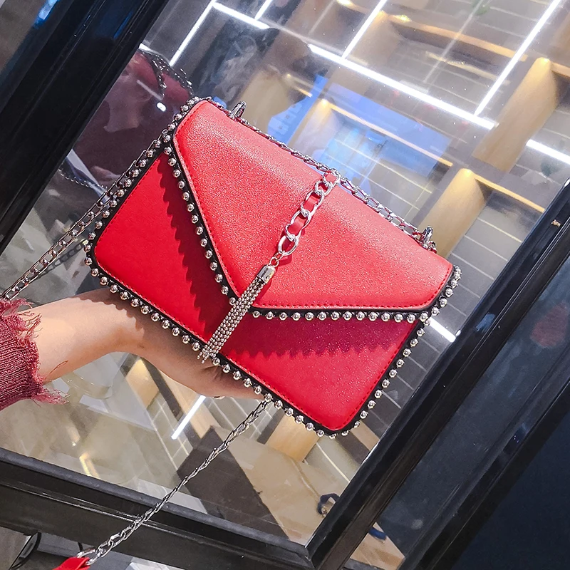 

Wholesale new fashion leather designer rivet lady shoulder bags designer clutch bags women famous brands