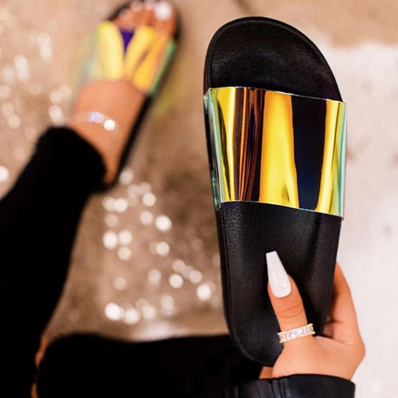 

Catch their eye in these platform slides that have a thicc sole and a chromatic toe strap with an easy slip on fit., 2colors