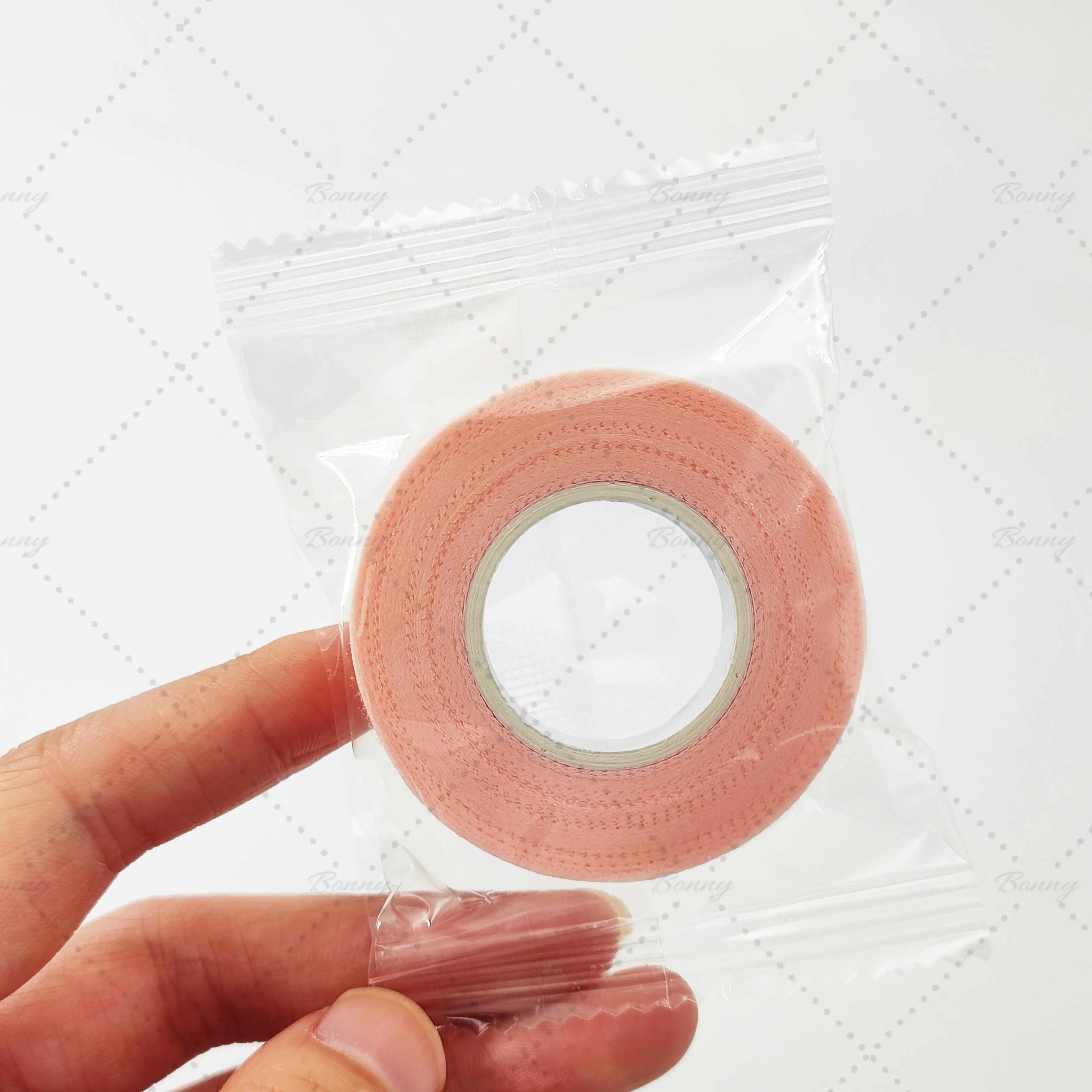 

Free Sample Microporous Medical Eyelash Grafting Tape Silica Gel Surgical Nonwoven PE Micropore Tape Roll For Lash Extensions