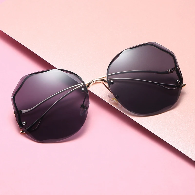 

DCOPTICAL Hot Sale Rimless Sunglasses Fashion 2021 Fashion Round Women Retro Trendy Sunglasses