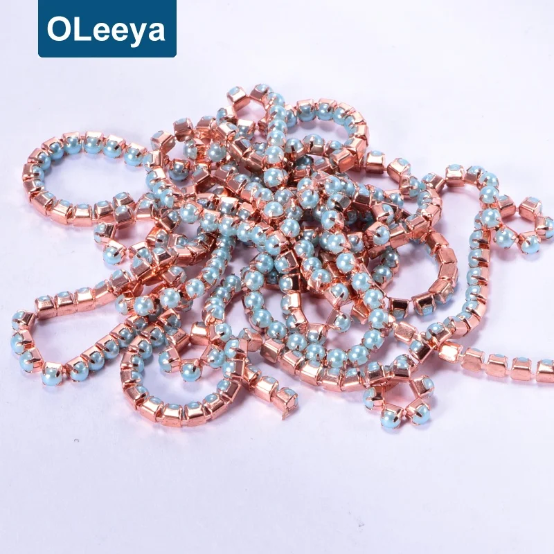 

Wholesale SS8 Rhinestones Banding Rose Gold Base Pearl Trim Close Cup Chain Rhinestone Crystals for Sandals Decoration, Sew on rhinestones with claw close cup chain