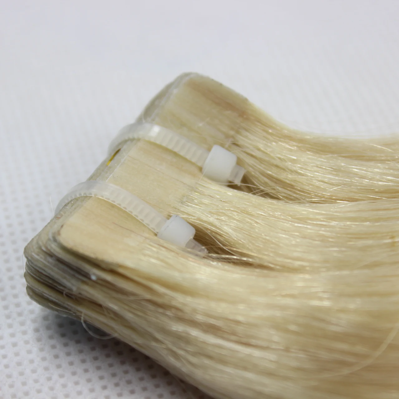 

Double Drawn Injection Tape Hair Extensions made of Premium Virgin Remy Hair
