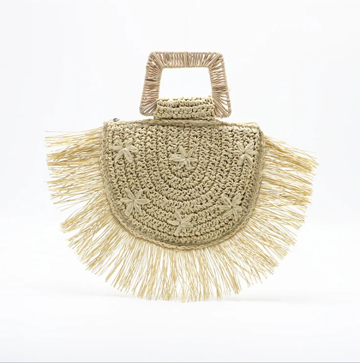 

Luxury hollow out design hand woven raffia bag beach with round handle