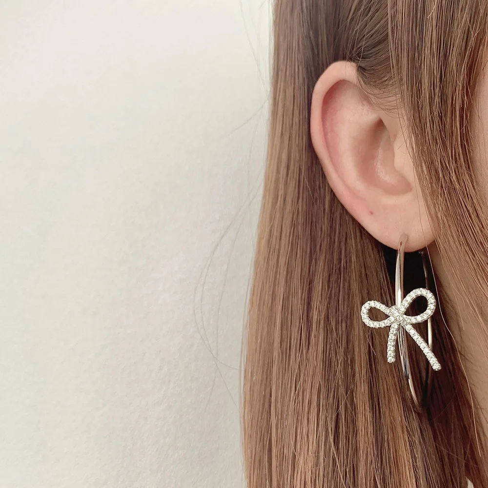 

Iced out butterfly earrings 18k gold hoop earrings