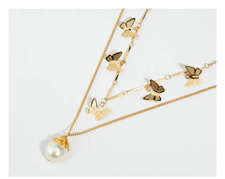 

Occident pearl necklace with individual gold butterfly choker