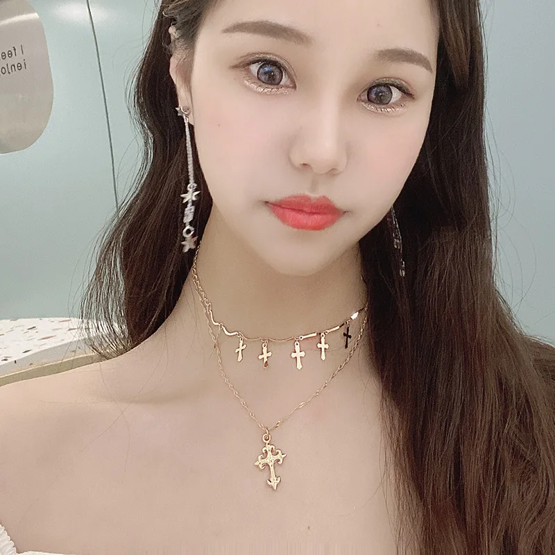 

Crucifix pendant clavicular choker
