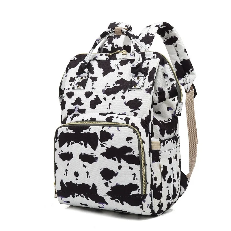 

Unique large capacity fashion portable mommy bags backpack designer baby diaper Bag backpack cow print diaper bag wholesale