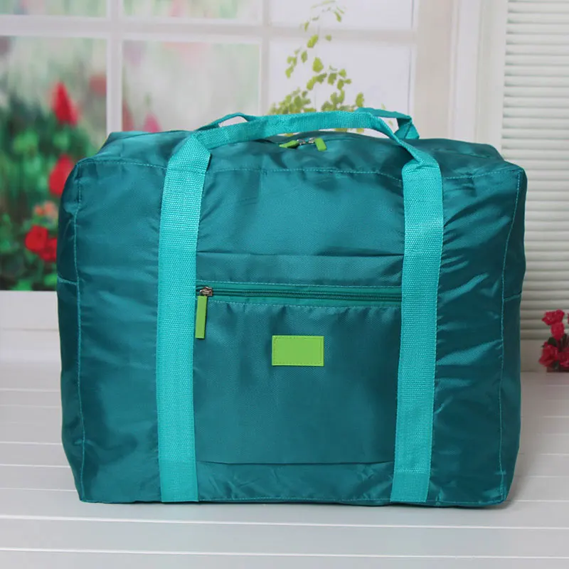 Wholesale low cost foldable versatile waterproof nylon luggage travel storage bag on sale