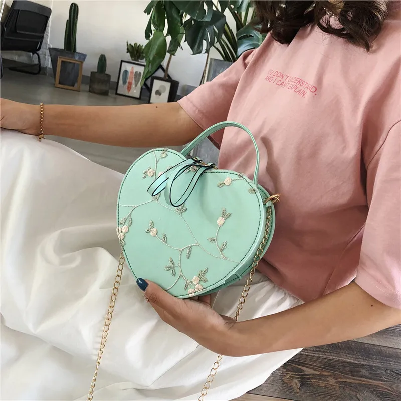 

Good Quality Pu Leather Handbags For Women Luxury Portable Peach Heart Shape Crossbody Bag With Chain Factory Direct Wholesale, Available in 4 colors with color card