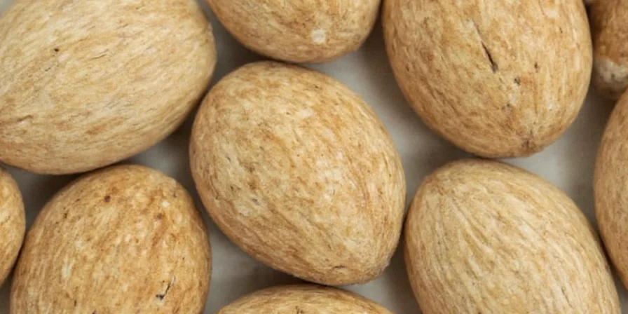 Nutmeg and Mace Whole Spices Side by Side