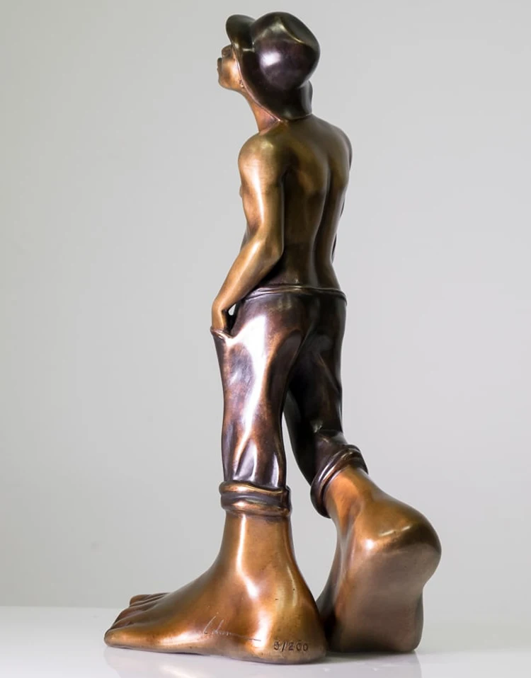 bronze blowing whistle statue
