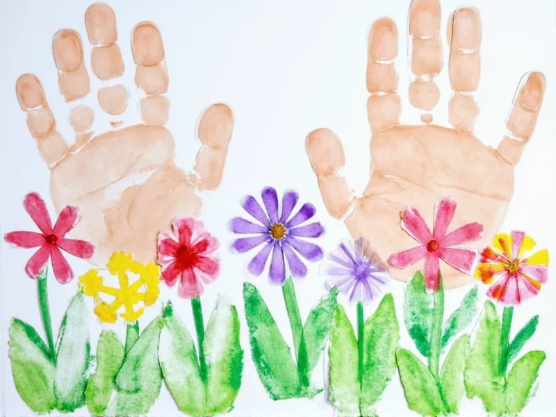 Child's handprint transformed into flower garden on Mother's Day card
