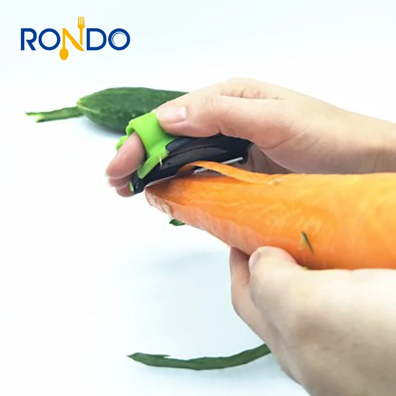 

2021 new style stainless steel fruit and vegetable peeler silicone material finger handle, Green