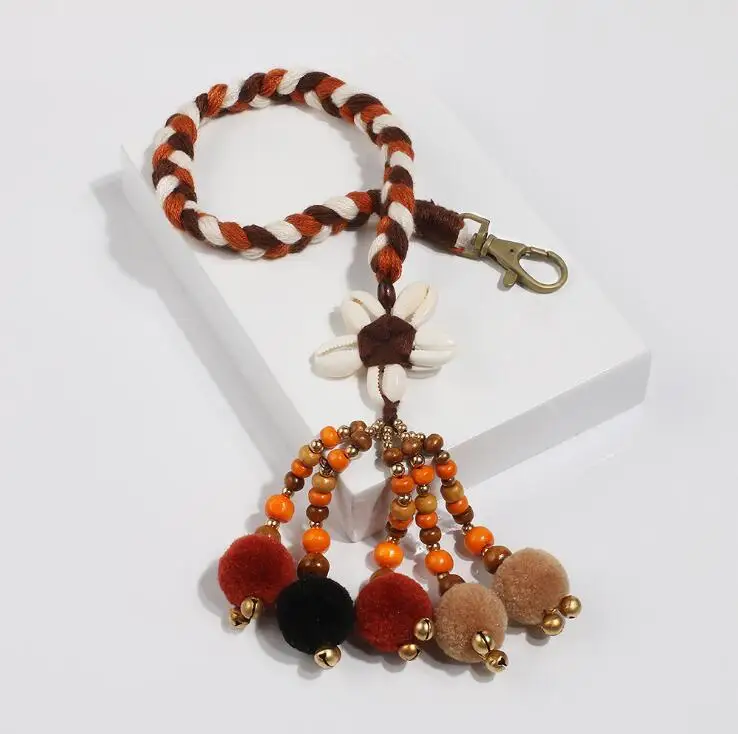 
wholesale boho fur ball drop key chain braid tassel key chain with shell beaded for travel gift 