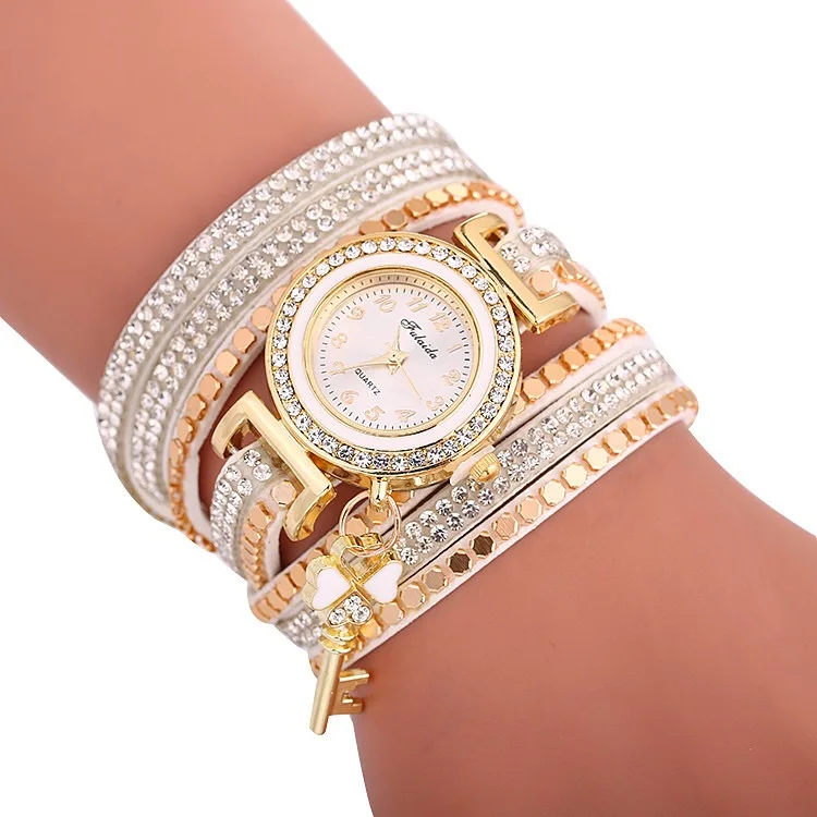 

2019 Hot Sell Ladies Bracelet Wrist Watch Fashion Girl Watches With Shiny Magic Key Pendants, Multiple colors