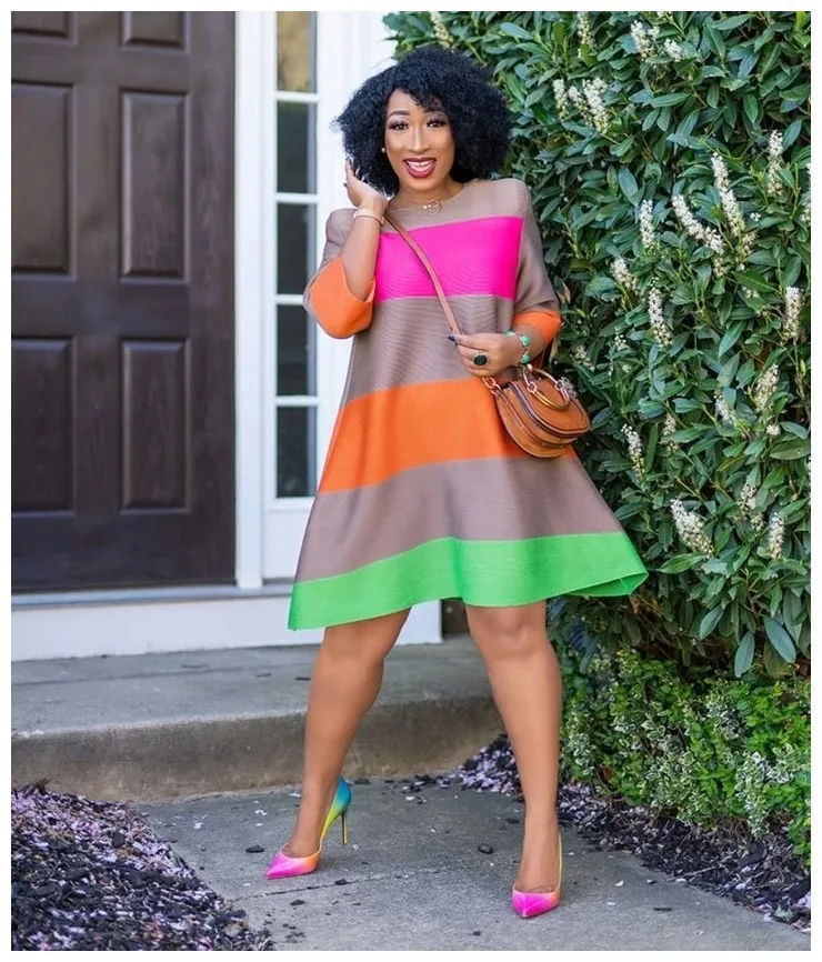 

In the summer of 2020, the new African women's dress locates in Europe and America with printed and colored stripe casual dress, Shown
