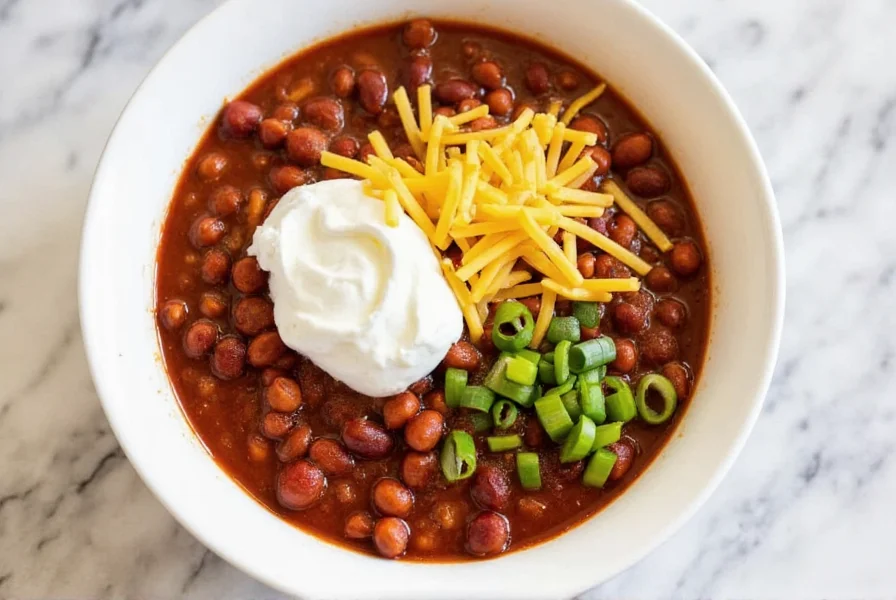 Finished pressure cooker chili served in white bowl