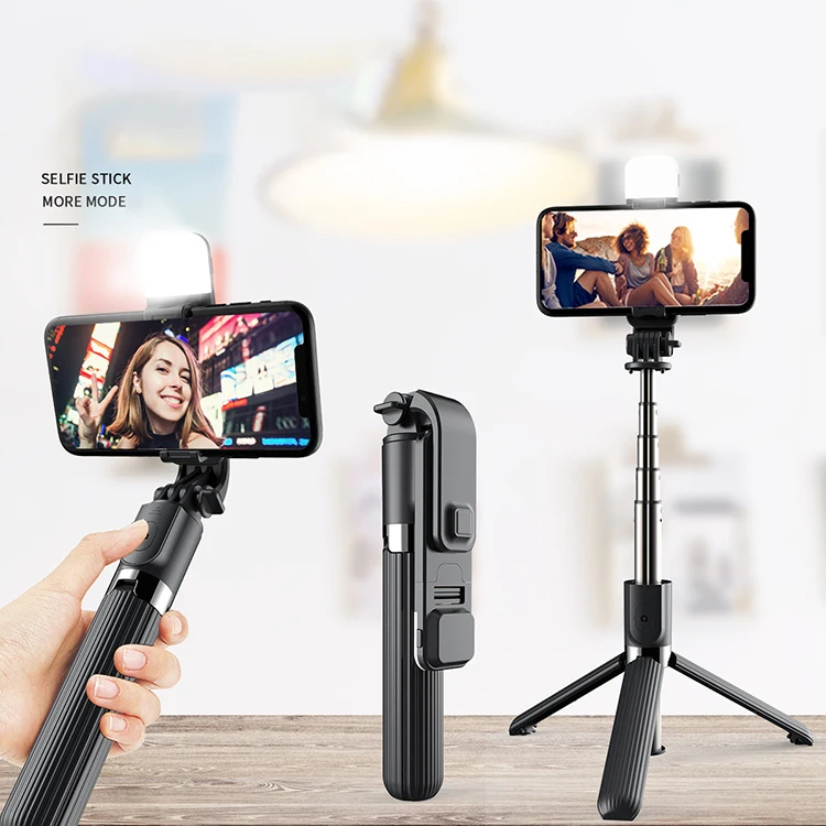 

New 3 In 1 Mini 360 Degree Selfie Stick Handheld Telescopic wireless selfie stick tripod With fill light