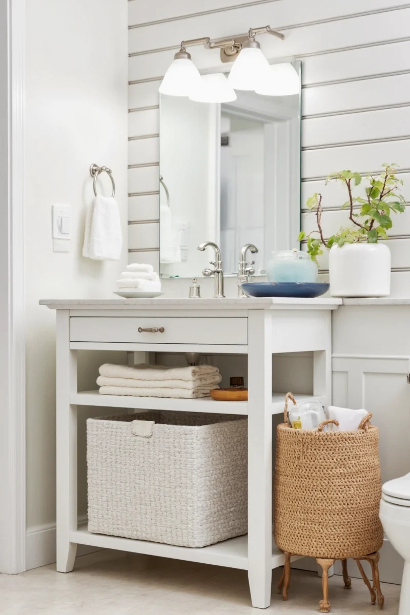 Floating shelves with dividers in bathroom