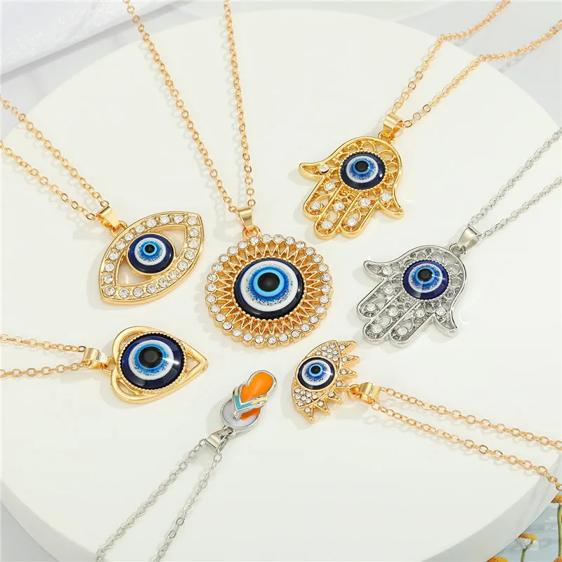 

2022 Hot Selling Turkish Blue Eye Pendant Necklace Paved Crystal Evil Eyes Luck Hand Slippers Necklace For Girls