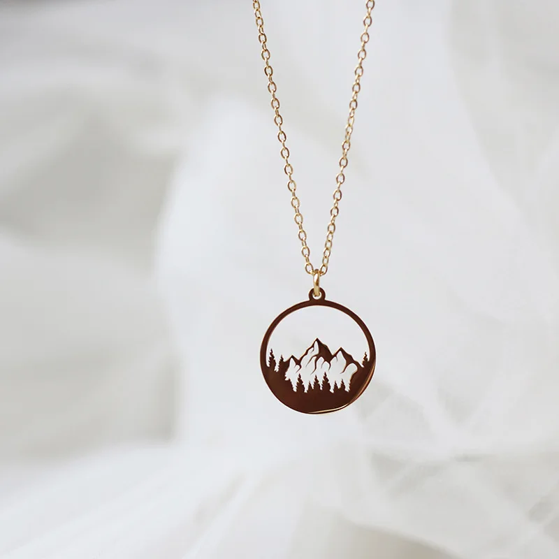 

LCN-035 Stainless steel plated 14K gold wholesale Hollow out Snow mountain forest Beautiful Necklace