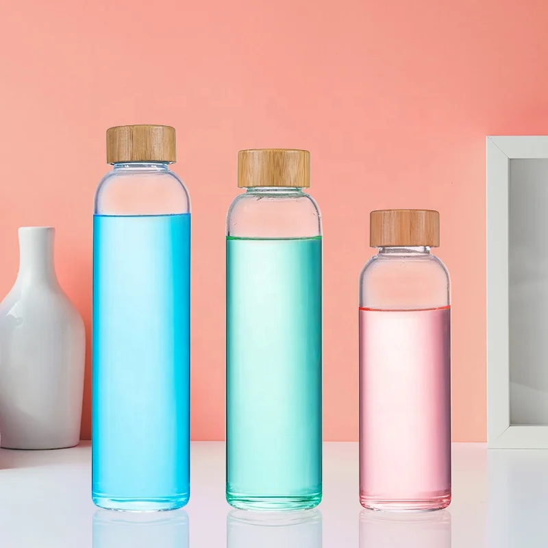 

Guaranteed Quality Reusable Custom Logo Personalized Thick Clear Bamboo and Glass Water Bottle Applicable for Boiling Water Fall, Transparent