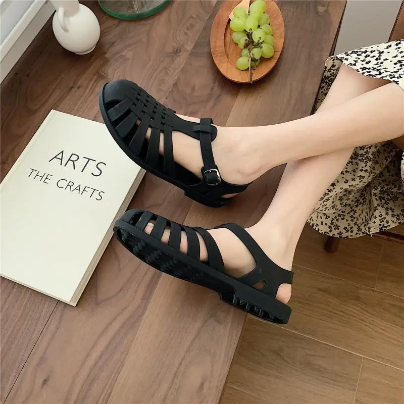 

Girls Candy Color Flat Shoes PVC Hollow Casual Beach Outdoor Female Soft Custom Jelly Sandals