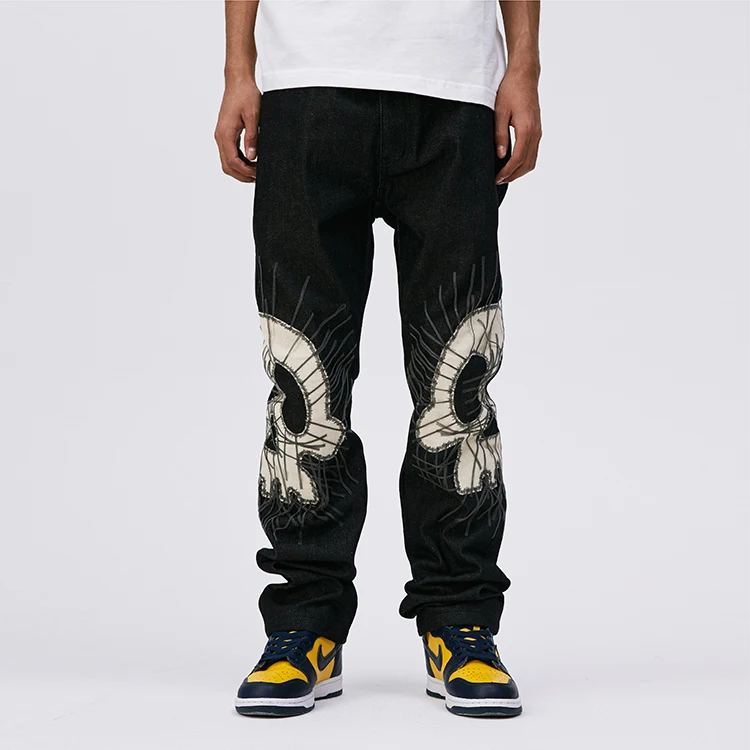 

HUNTW Halloween series black denim trousers with skull patch and fringe embroidery