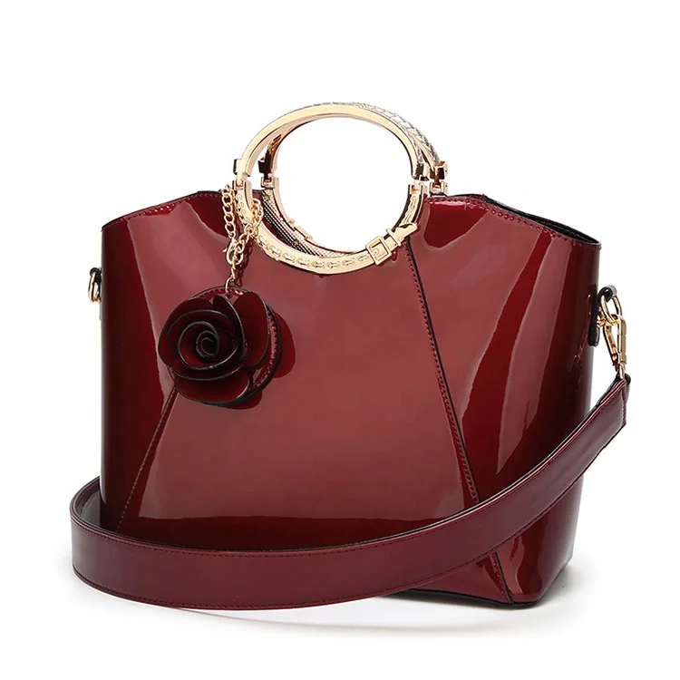 

brief style shinny leather designer handbag women with round metal handle