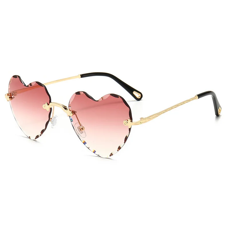 Cheap new fashion rimless sunglass Shades trend personality heart sunglasses women 2022