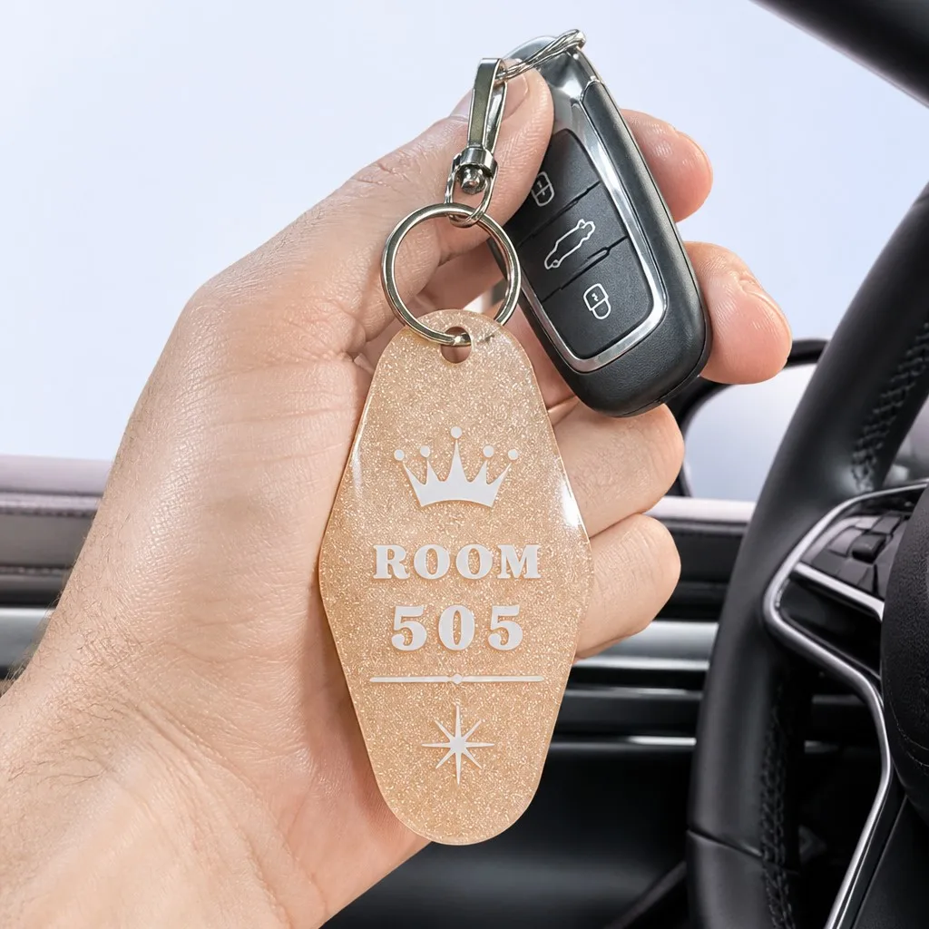 Caucasian Male Hand Holding Keychain with Automotive Key Fob