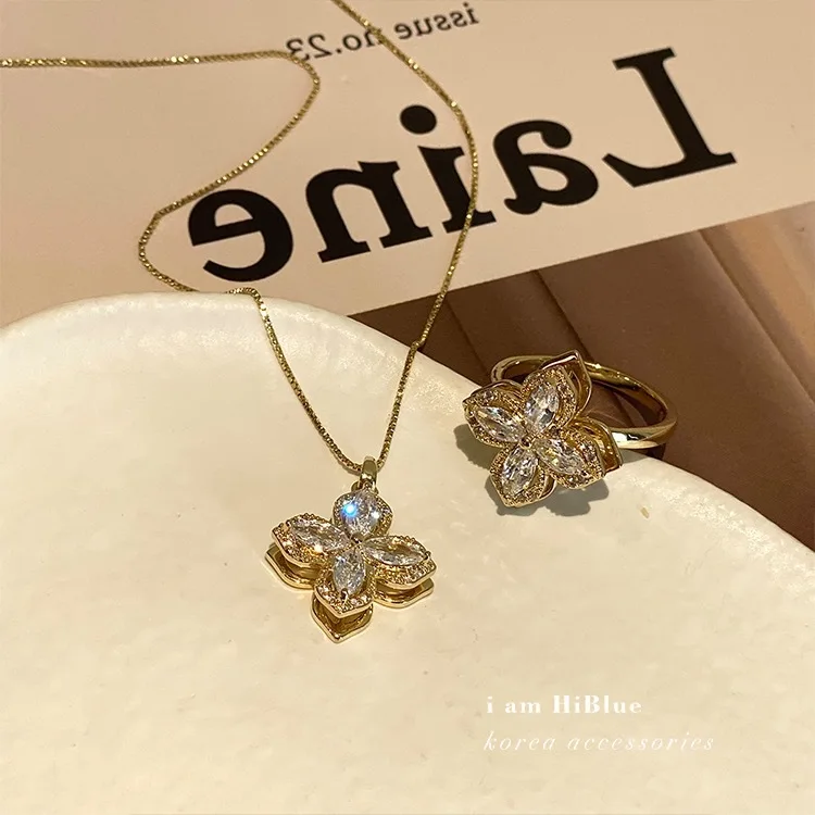 

S925 Silver Needle Rotating Four-leaf Clover Necklace Ring Earring Damping Rotating Windmill Earrings, Picture