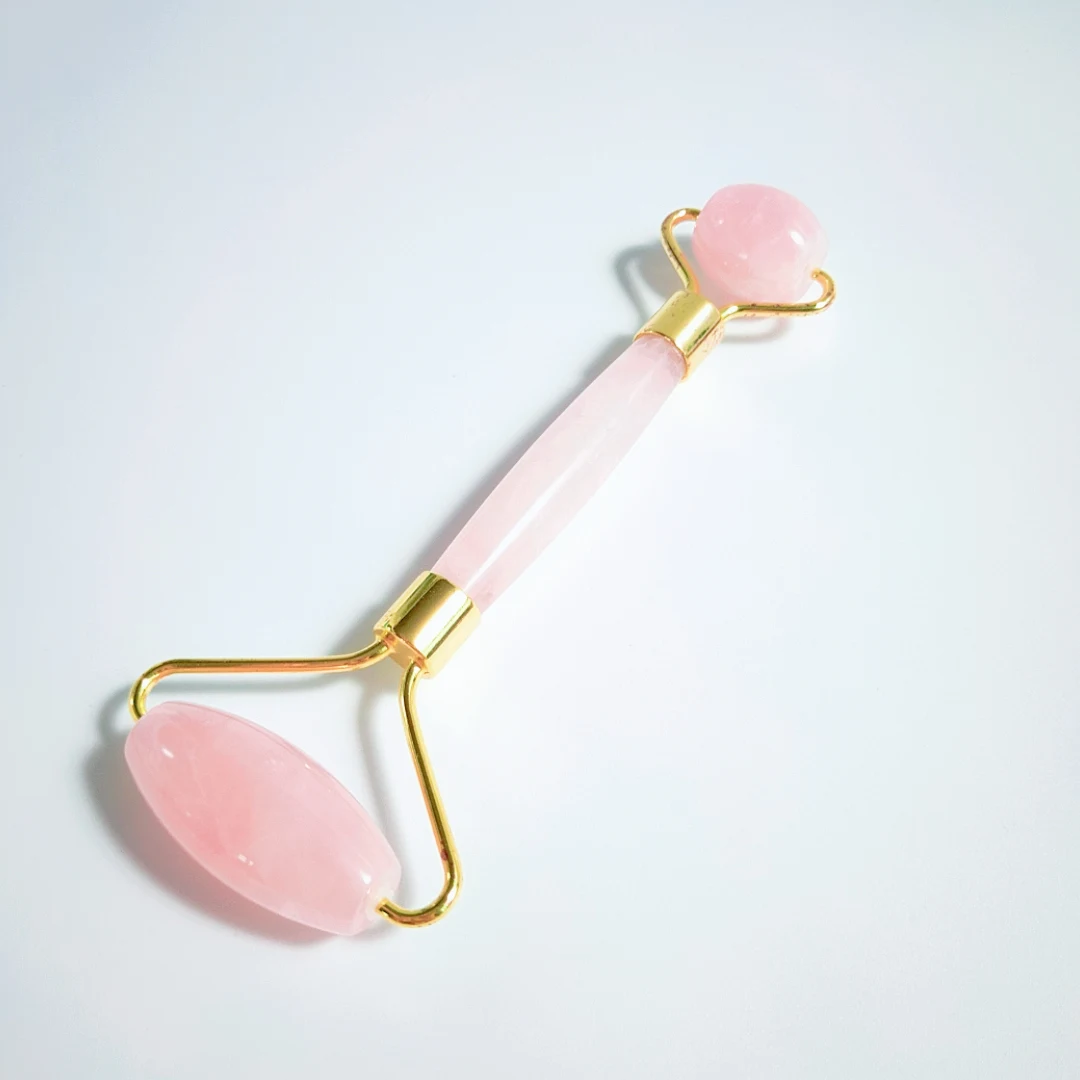 

Natural Rose Quartz Facial Jade Stone Roller Face Massager Beauty Massage Tool.