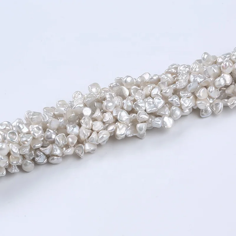 

Wholesale  High Quality Natural White Freshwater Reborn Keshi Loose Pearls Strand