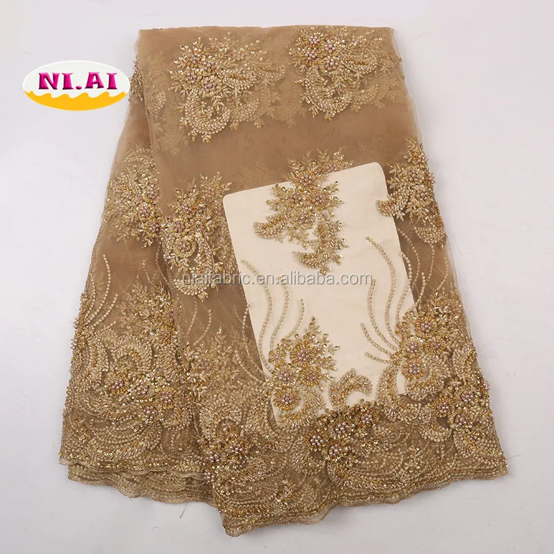 

New Arrivals Handmade Lace Fabric For Wedding Dress High Quality French Net Lace Fabric Hot Sale Beaded Lace Fabric