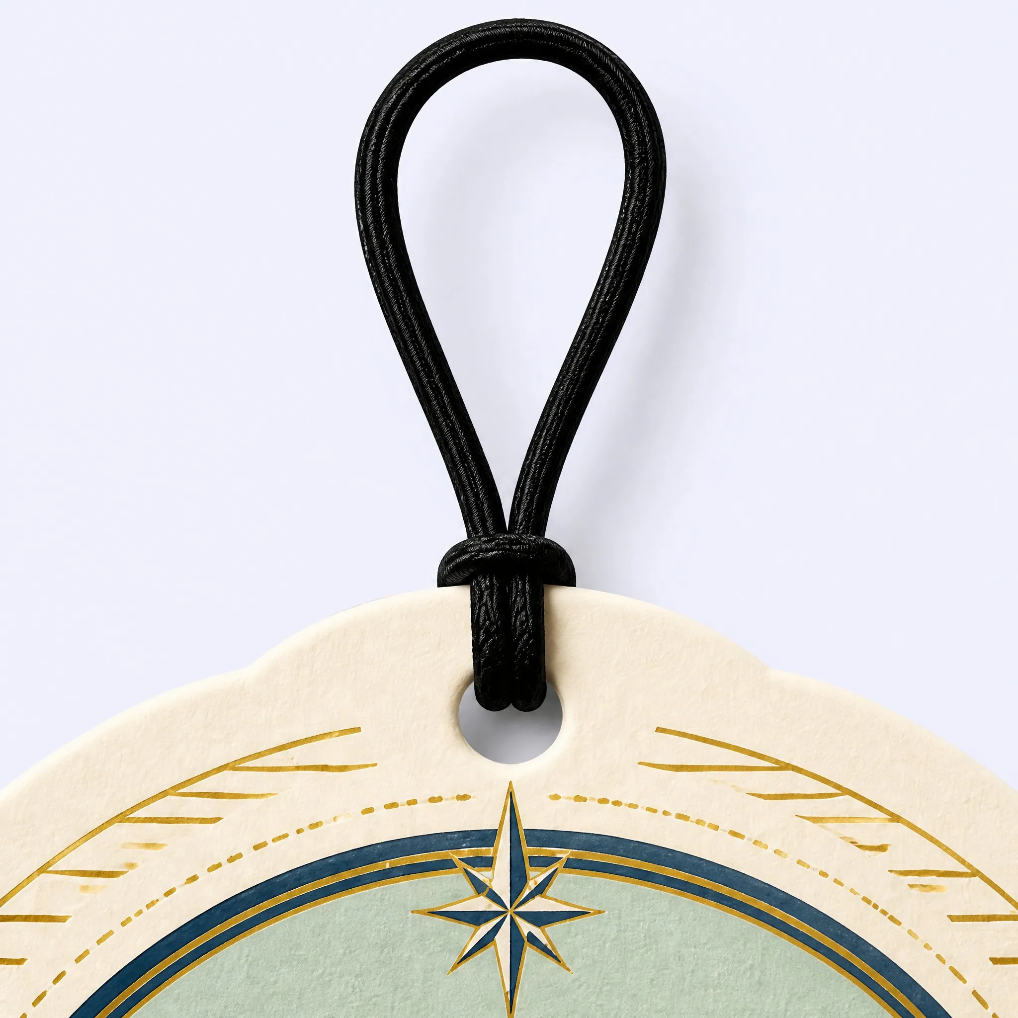 Top Detail of Ocean Wave Air Freshener with Elastic Cord Loop and Gold Star Dial