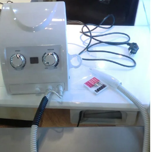 

Nail Filling Machine with Vacuum System