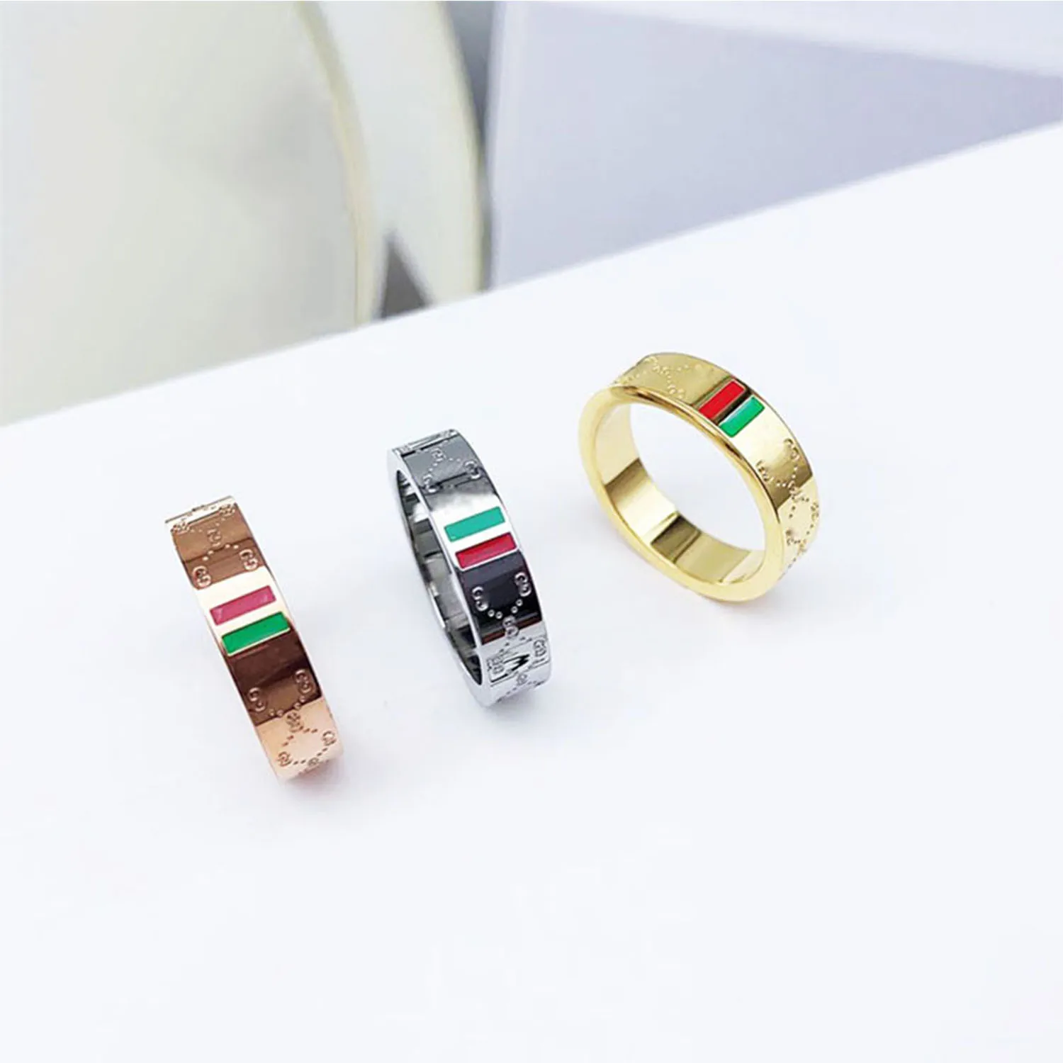 

Retro Double G Ring Couple Ring for Men and Women Red and Green Stripes Titanium Steel Plated 18k