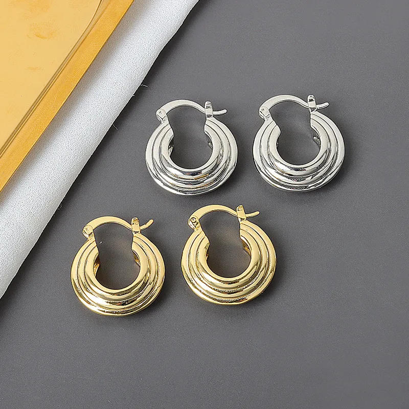 

Korean East Gate retro gold round diamond pattern earrings, exaggerated geometric Circle Earrings