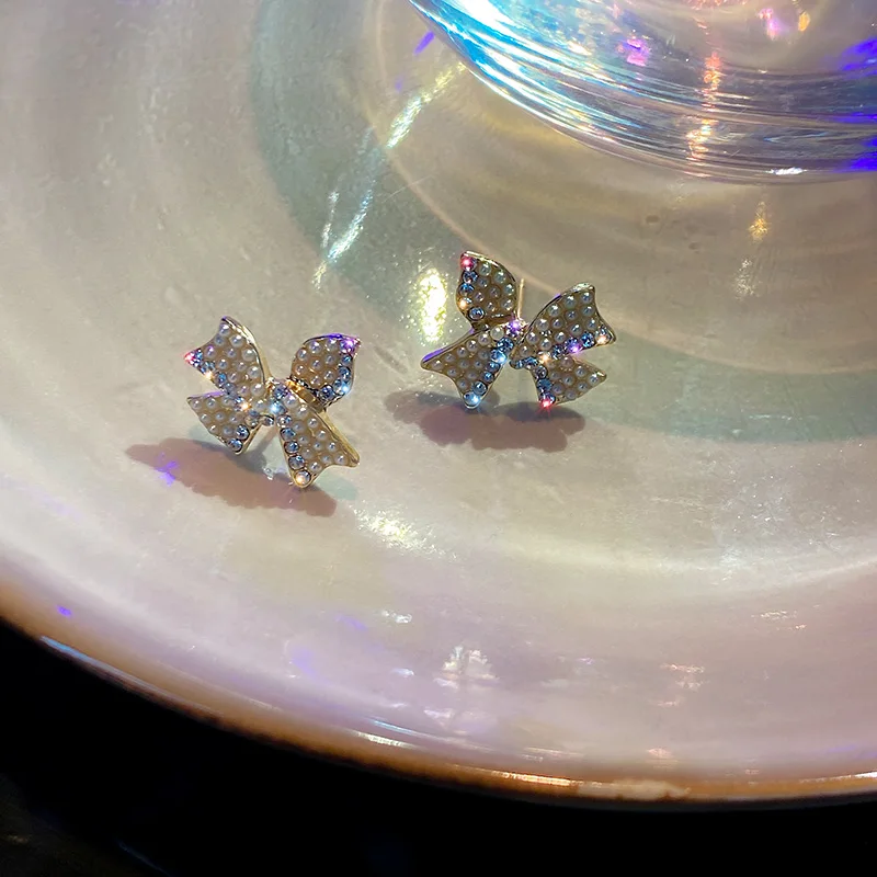

trendy fashion gold plated bow pearl earrings women