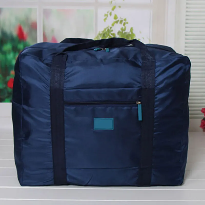 Wholesale low cost foldable versatile waterproof nylon luggage travel storage bag on sale