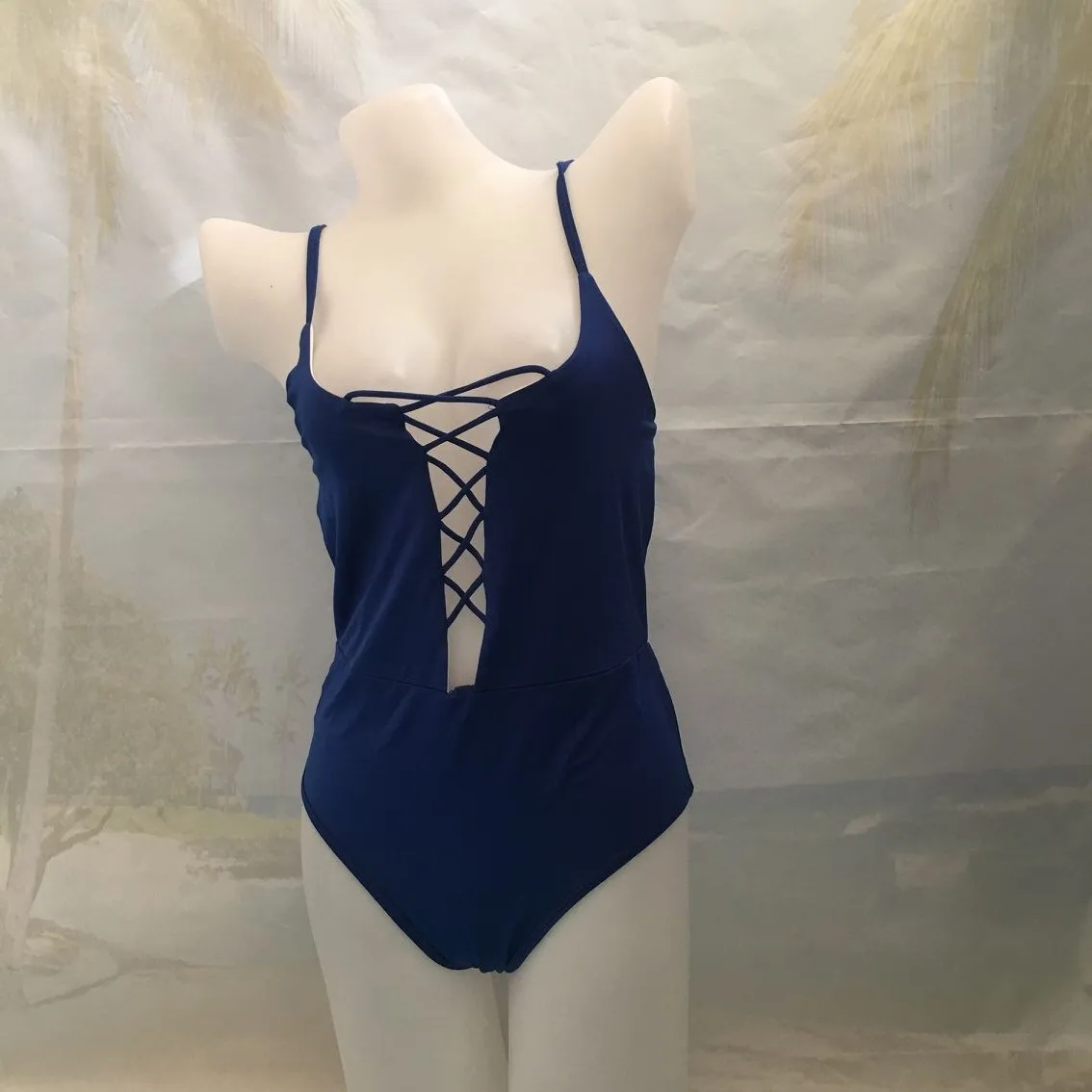 

Fashion style ladies baby blue solid backless cross front one piece swimsuit