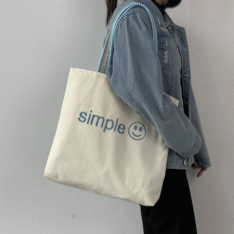 

2022 new embroidery low moq large capacity folding canvas shopping bags with custom printing logo, Customized