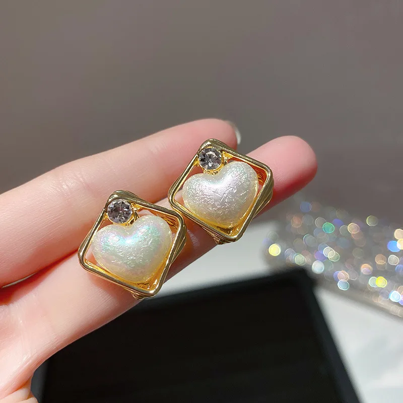 

new statement hollow crystal white heart earings