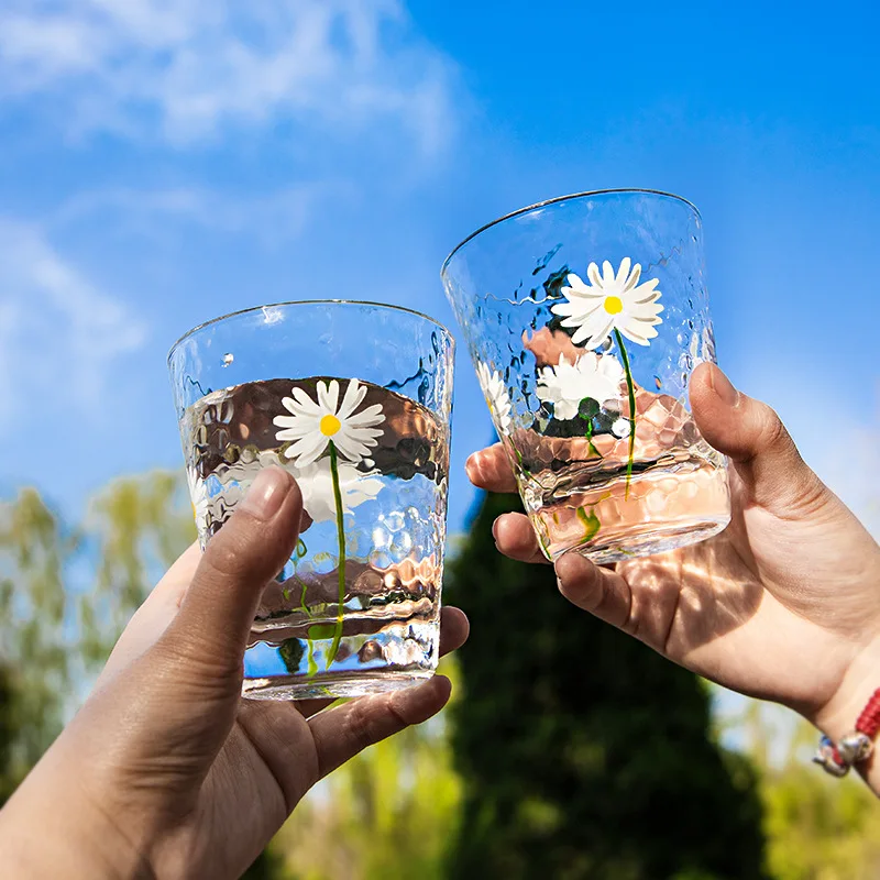 

Supplier Popular Daisy Painting Decoration Hammered Clear Highball Water Glass Tumbler Cups