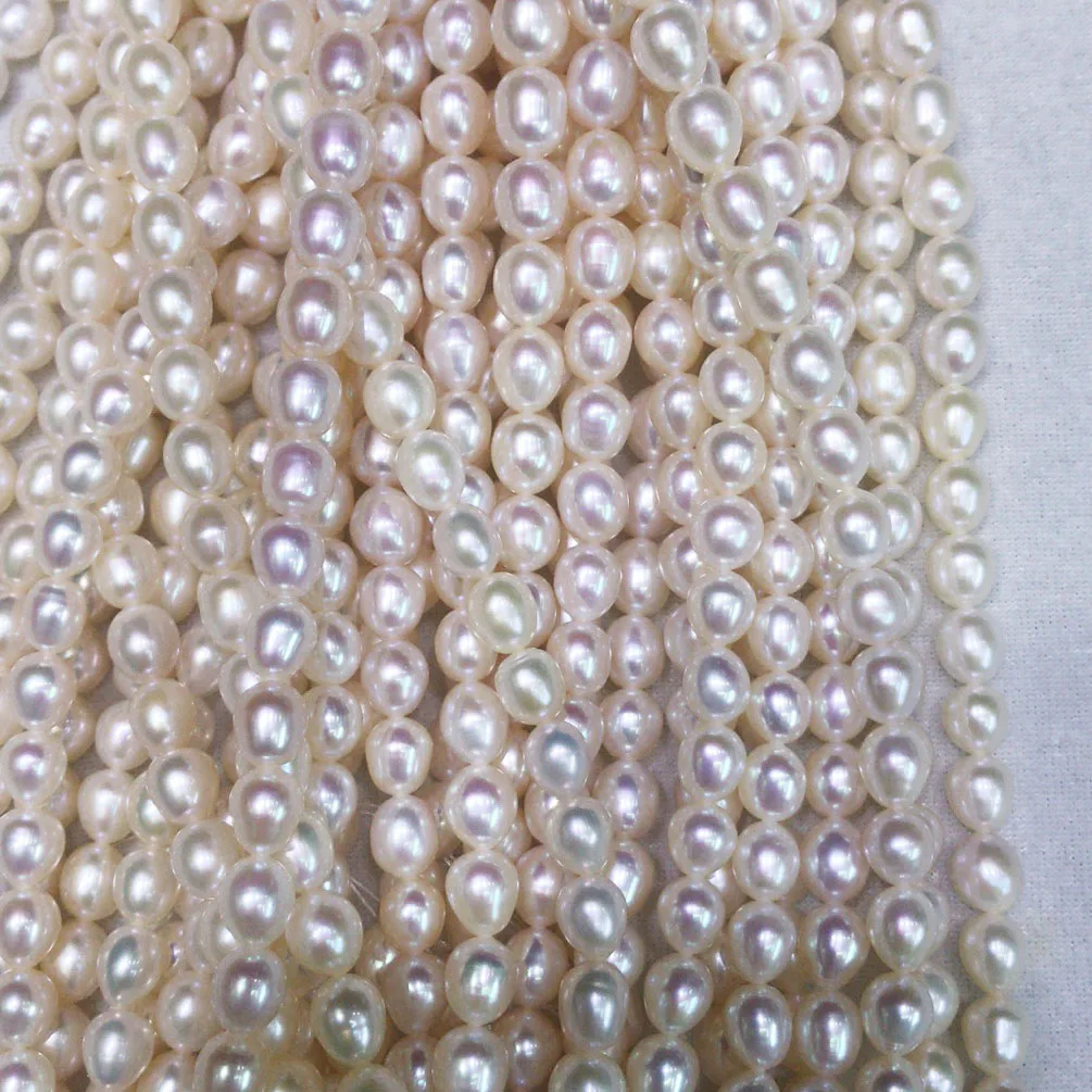 

100% FRESHWATER PEARL 8-10 mm AAAA grade high quality rice shape pearl in strand loose wholesale freshwater pearl