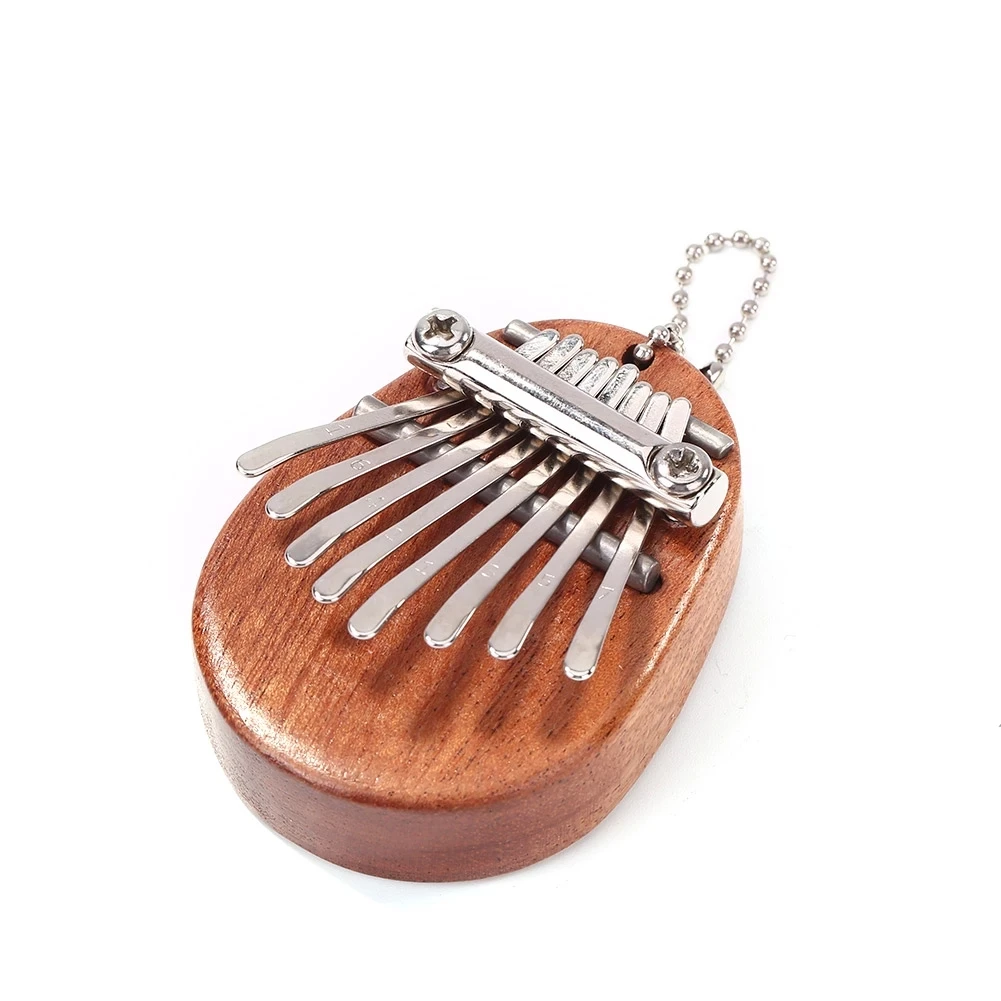 

Thumb Piano Percussion Musical Instrument Mahogany Wood Portable Thumb Piano Mini 8 Keys Kalimba Children Birthday Gift