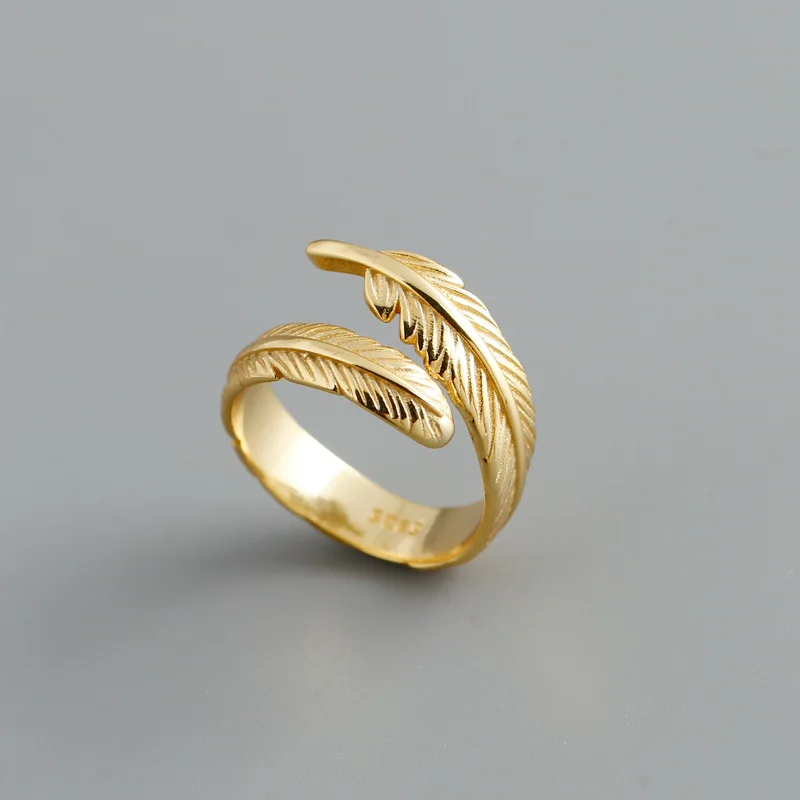 

JUHU Europe And America Hot Personality Feather Cold Wind Gold Ring Couple Ring