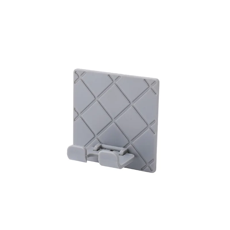 

Kitchen and bathroom storage rack mobile phone remote control rack wall-mounted self-adhesive foldable power plug hook