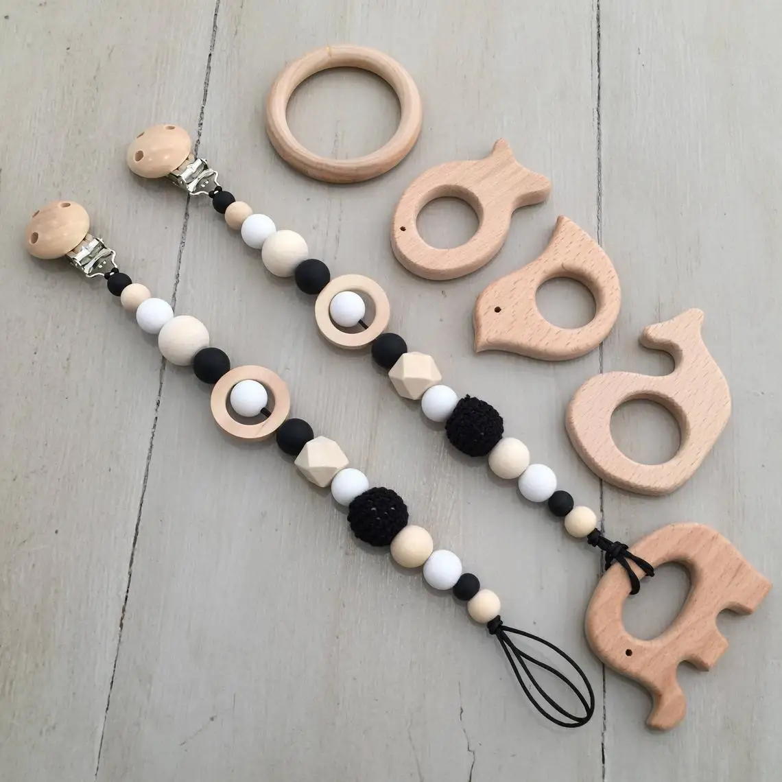 

Wholesale Crochet Wood Silicone Beads Baby Three Hole Pacifier Clips